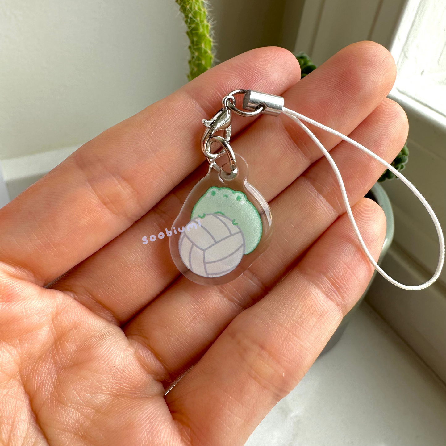 Bobo the Frog Playing Volleyball Phone Charm