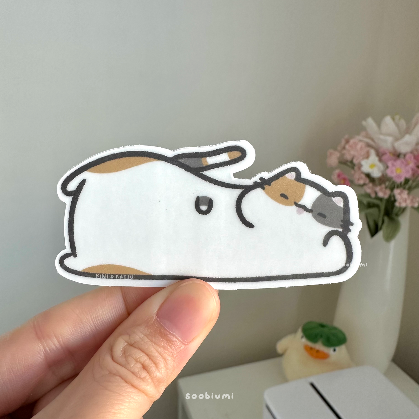 Kiwi the Cat Laying Down Sticker