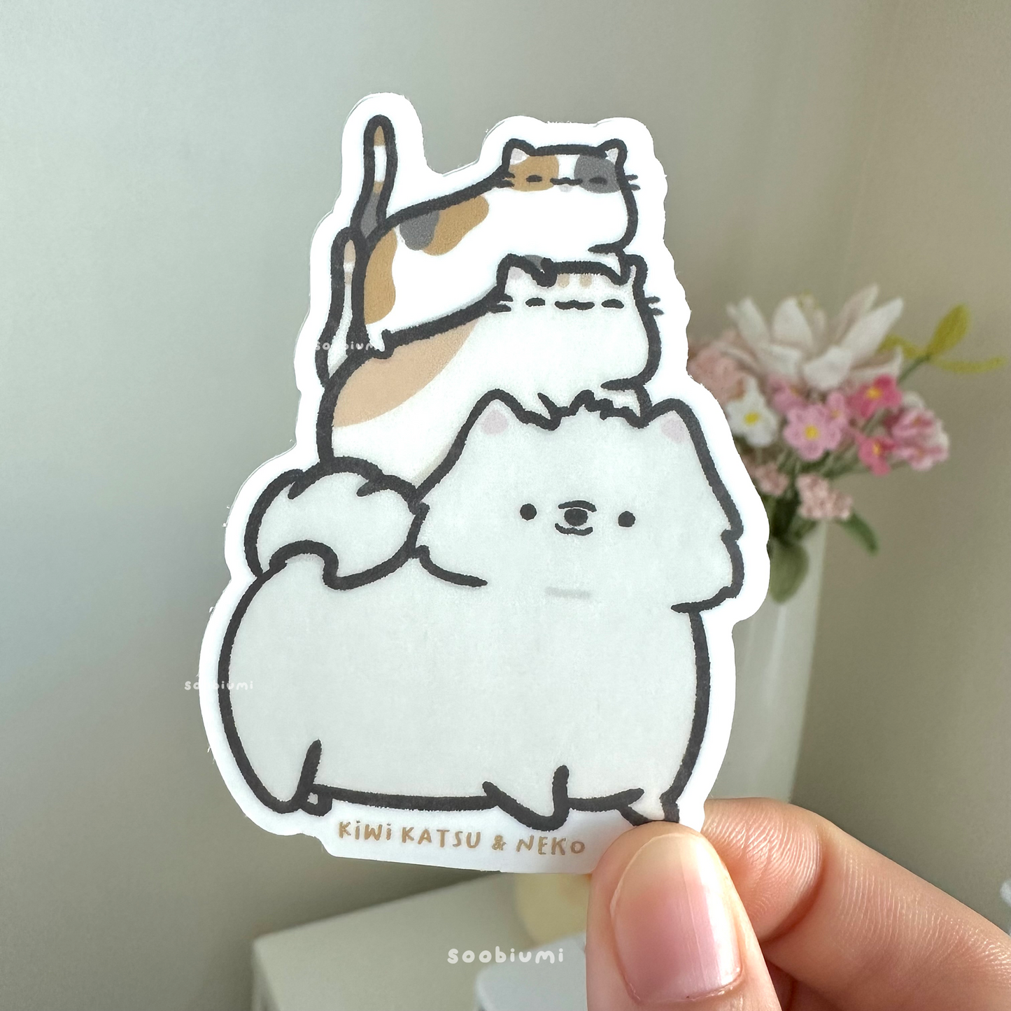 Kiwi and Katsu the Cats Riding Neko the Samoyed Sticker